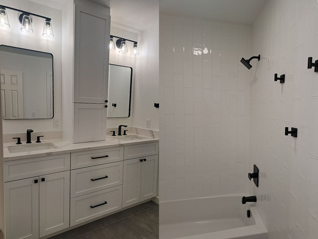 Bathroom vanity with vessel sinks and backlit mirrors
